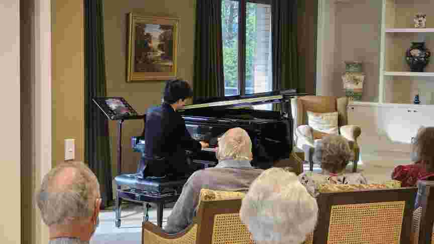 Striking a chord: Pianist Lixin Zhang delights residents at fundraising concert